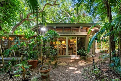 Tucked along one of Coconut Grove's most coveted streets, this - photo 5