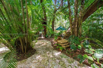 Tucked along one of Coconut Grove's most coveted streets, this - photo 6