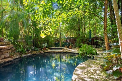 Tucked along one of Coconut Grove's most coveted streets, this - photo 8