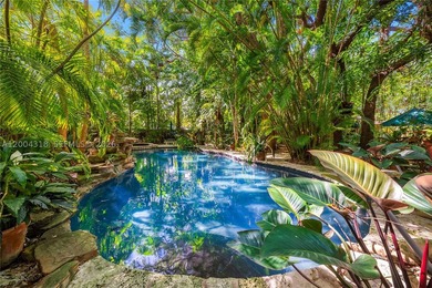 Tucked along one of Coconut Grove's most coveted streets, this - photo 9