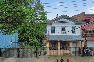 Detached Bronx multifamily with oversized lot, parking, income - photo 3