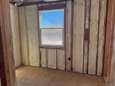 17 Bayport Road, Mastic Beach is a quiet and serene two-bedroom - photo 12