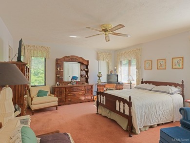 Privacy abounds on this exceptional 11+ acre property featuring - photo 14