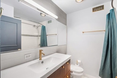 Two bedrooms. Lake view. Endless possibilities. Perched on the - photo 10