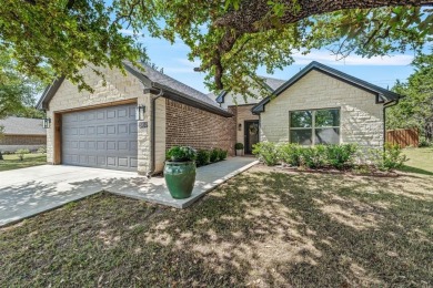 Let's start with the Amazing Backyard-Mueller Outbuilding with - Lake Home For Sale in Granbury, Texas