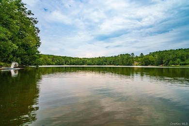 Lakefront Retreat in Yulan, NY This isn't just a home on the - photo 2