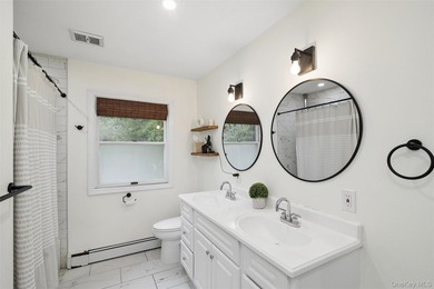 Nestled on a private and picturesque .88-acre property, this - photo 13