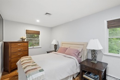 Nestled on a private and picturesque .88-acre property, this - photo 15