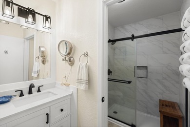 UPDATED! This beautifully transformed 2BR, 3BA condo offers the - photo 17