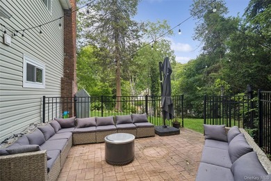 Nestled on a private and picturesque .88-acre property, this - photo 18