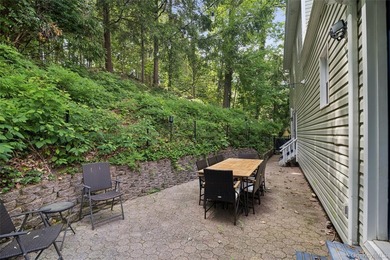 Nestled on a private and picturesque .88-acre property, this - photo 21