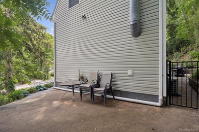 Nestled on a private and picturesque .88-acre property, this - photo 22