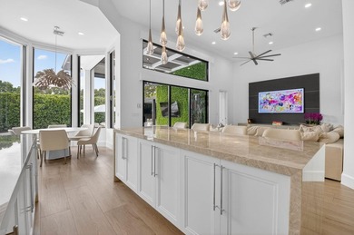 Completely renovated in 2024, this exceptional Woodfield Boca - photo 22