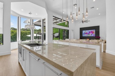 Completely renovated in 2024, this exceptional Woodfield Boca - photo 27