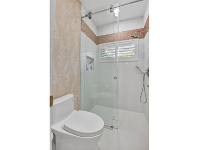 Completely renovated in 2024, this exceptional Woodfield Boca - photo 40