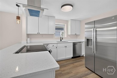 WELCOME HOME TO THIS LOVELY 3 BEDROOM 2 BATH EQUIPPED WITH ALL - photo 12
