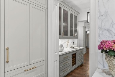 Designed by Harrison Design, this architecturally significant - photo 33