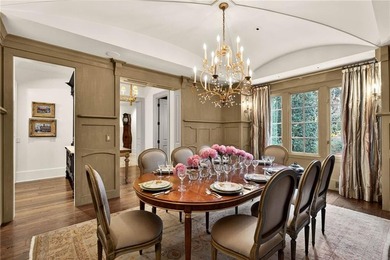 Designed by Harrison Design, this architecturally significant - photo 35