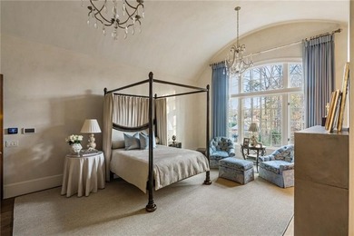 Designed by Harrison Design, this architecturally significant - photo 40