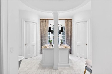 Designed by Harrison Design, this architecturally significant - photo 42