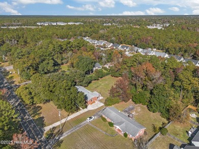 Coastal Charm Meets Timeless Brick Beauty in Porters Neck - - photo 50
