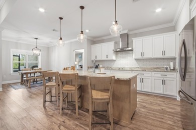 Embrace coastal charm at 810 Brushed Dune Circle, in the Gated - photo 3