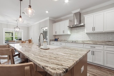 Embrace coastal charm at 810 Brushed Dune Circle, in the Gated - photo 4