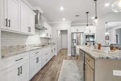 Embrace coastal charm at 810 Brushed Dune Circle, in the Gated - photo 5