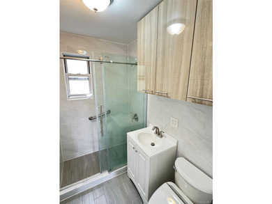 New updated bathroom 5/1/2026! Beautiful garden apartment with - photo 11