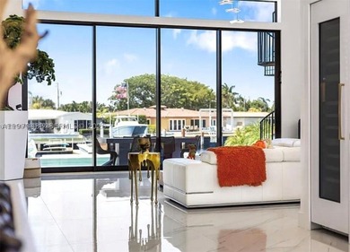 Stunning 4BR/4.5BA waterfront home in gated Bal Harbour. Nearly - photo 13