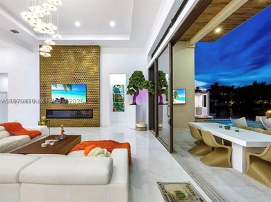 Stunning 4BR/4.5BA waterfront home in gated Bal Harbour. Nearly - photo 14