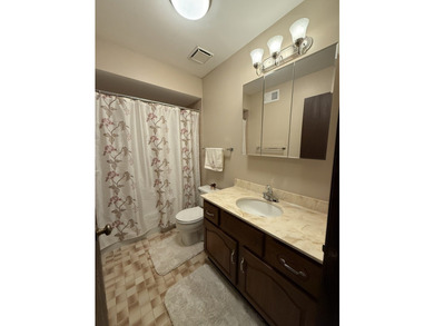 Welcome to this beautifully maintained second-floor condo in the - photo 15