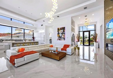 Stunning 4BR/4.5BA waterfront home in gated Bal Harbour. Nearly - photo 16