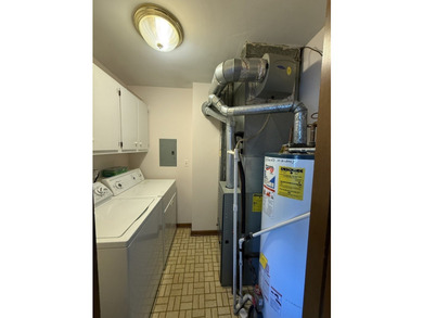 Welcome to this beautifully maintained second-floor condo in the - photo 16