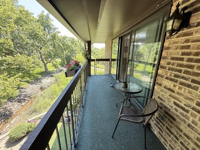 Welcome to this beautifully maintained second-floor condo in the - photo 17