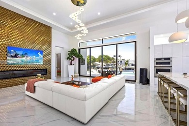 Stunning 4BR/4.5BA waterfront home in gated Bal Harbour. Nearly - photo 19