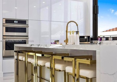 Stunning 4BR/4.5BA waterfront home in gated Bal Harbour. Nearly - photo 21