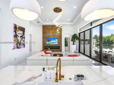 Stunning 4BR/4.5BA waterfront home in gated Bal Harbour. Nearly - photo 22