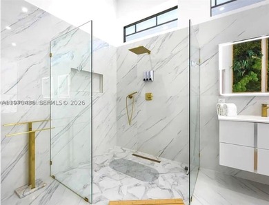 Stunning 4BR/4.5BA waterfront home in gated Bal Harbour. Nearly - photo 29