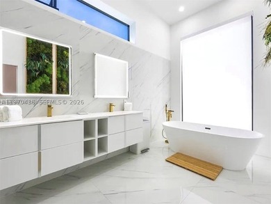 Stunning 4BR/4.5BA waterfront home in gated Bal Harbour. Nearly - photo 30