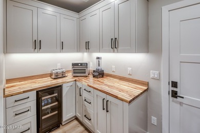 CUSTOM HOME nestled in the Bison foothills with beautiful lake - photo 33