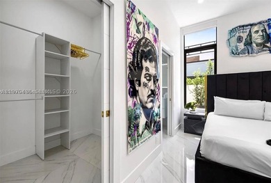Stunning 4BR/4.5BA waterfront home in gated Bal Harbour. Nearly - photo 35