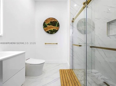 Stunning 4BR/4.5BA waterfront home in gated Bal Harbour. Nearly - photo 42