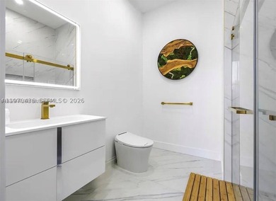 Stunning 4BR/4.5BA waterfront home in gated Bal Harbour. Nearly - photo 43