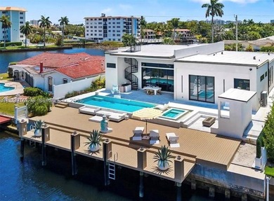 Stunning 4BR/4.5BA waterfront home in gated Bal Harbour. Nearly - photo 45