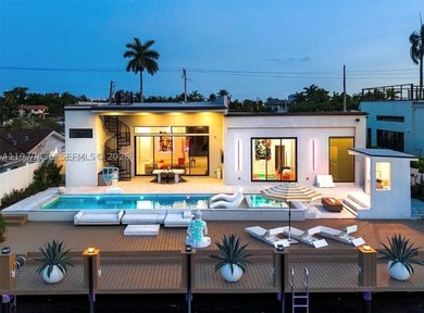 Stunning 4BR/4.5BA waterfront home in gated Bal Harbour. Nearly - photo 47