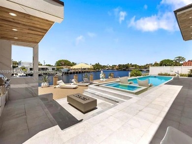 Stunning 4BR/4.5BA waterfront home in gated Bal Harbour. Nearly - photo 48