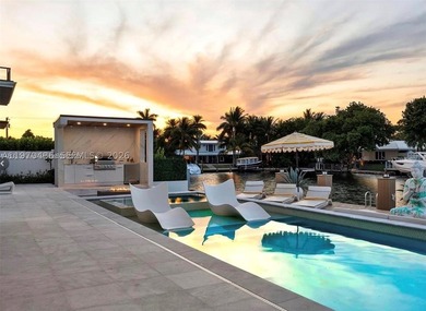 Stunning 4BR/4.5BA waterfront home in gated Bal Harbour. Nearly - photo 49