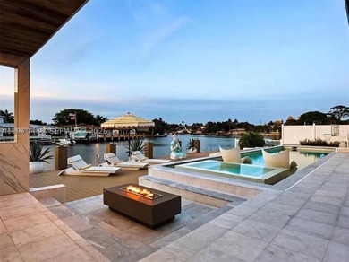 Stunning 4BR/4.5BA waterfront home in gated Bal Harbour. Nearly - photo 50