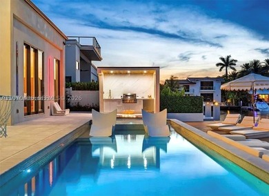 Stunning 4BR/4.5BA waterfront home in gated Bal Harbour. Nearly - photo 51